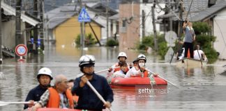 Residents are rescued by boat in Kurashiki, Okayama prefecture, western Japan
